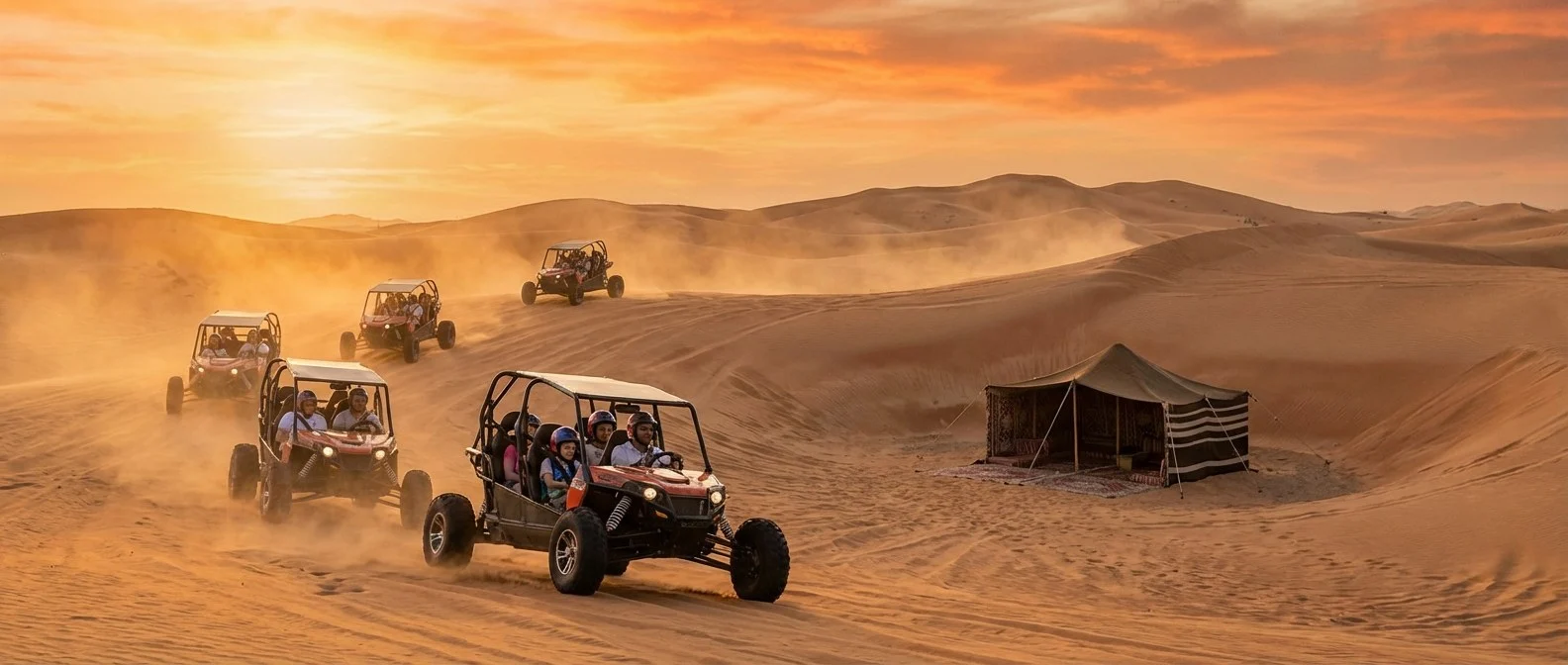 Tourists enjoying a morning desert safari in Abu Dhabi with dune buggies and quad bikes under a clear sky